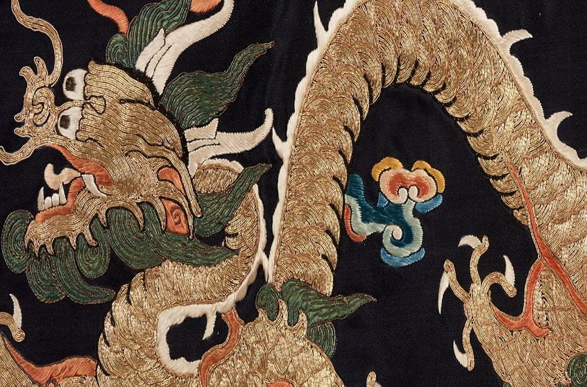 fragment of the robe with embroidered four-clawed dragon